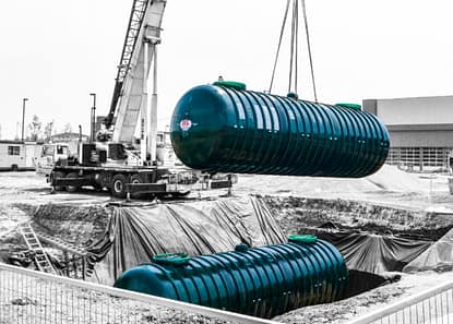 Large underground storage tanks being installed